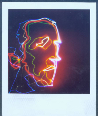 Illustration for article titled Fototron2000 Robot Artist Paints With LEDs, Spits Out Polaroids